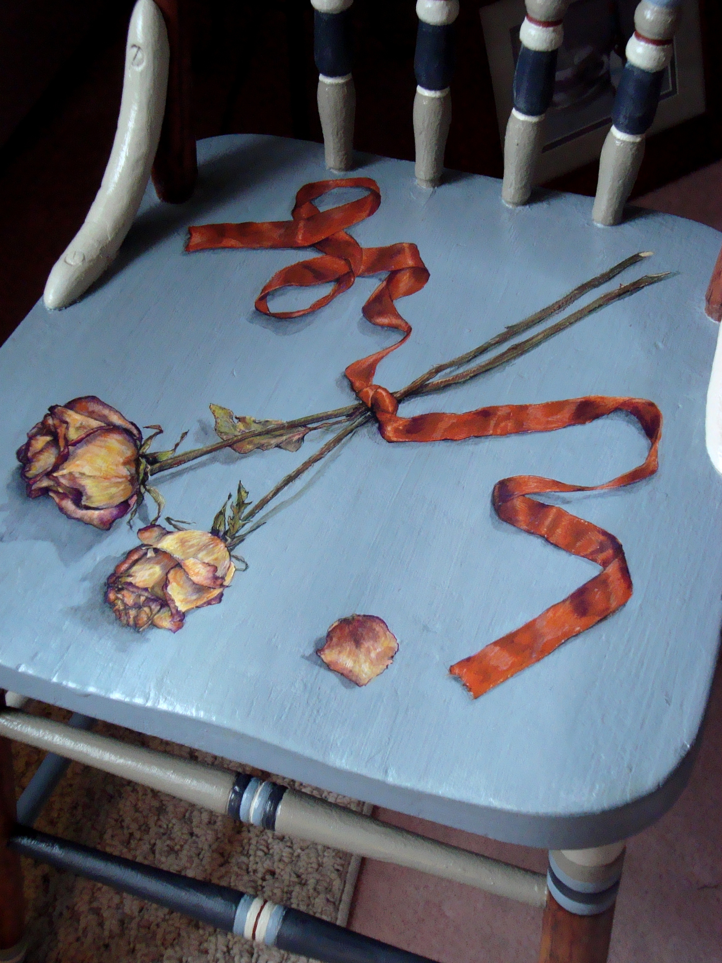 Chair Painted With Ribbons and Dried Roses