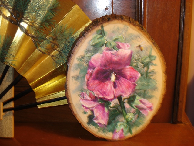 Hollyhock on Wood Slice